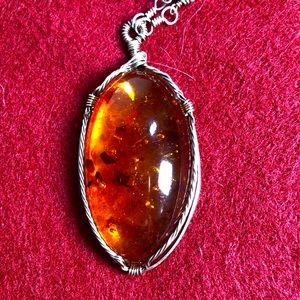 Artisan necklace. Amber pendant.